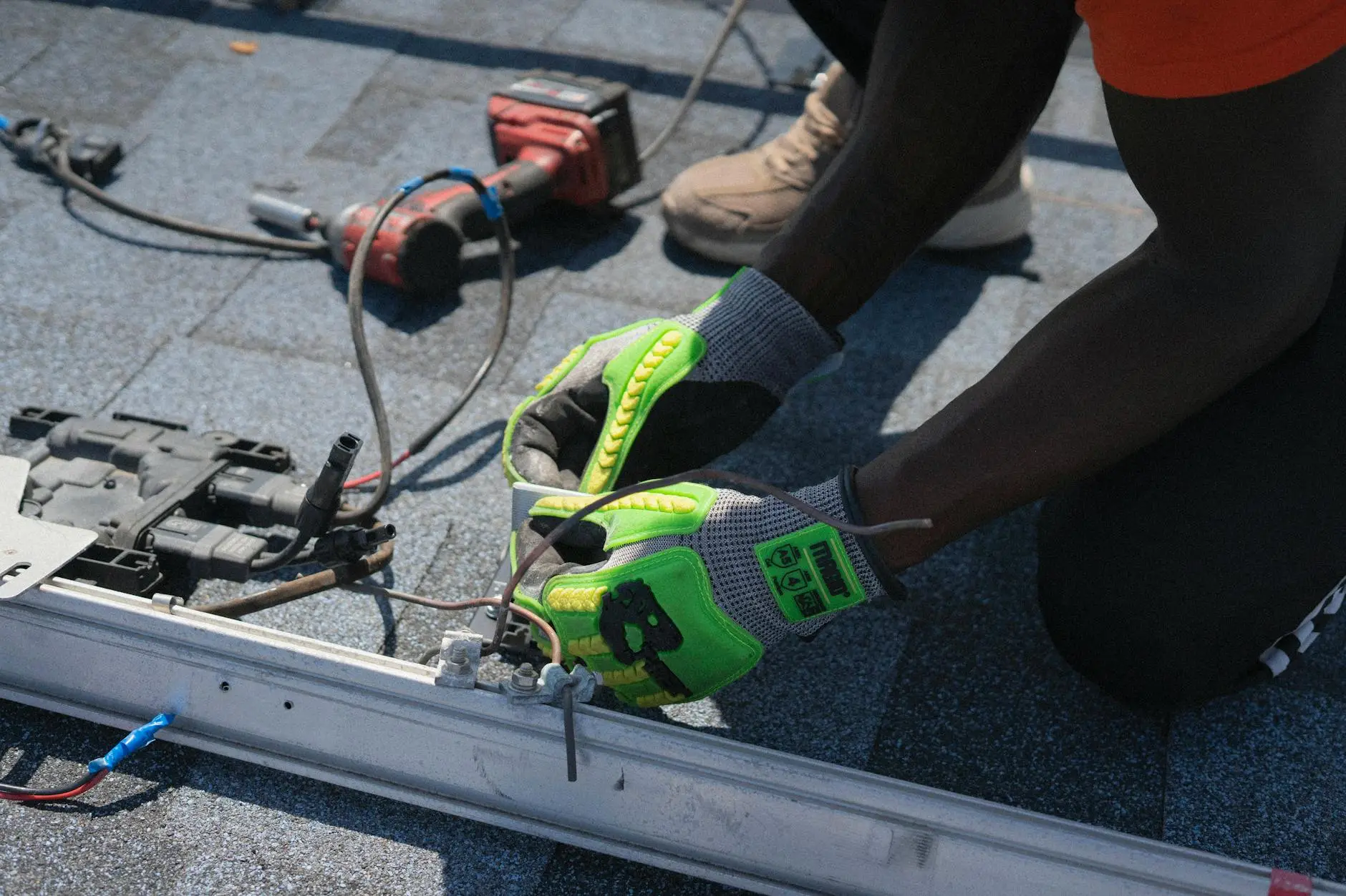 A close-up of high-quality asphalt shingles being installed with precise alignment on a Shepherdsville home.